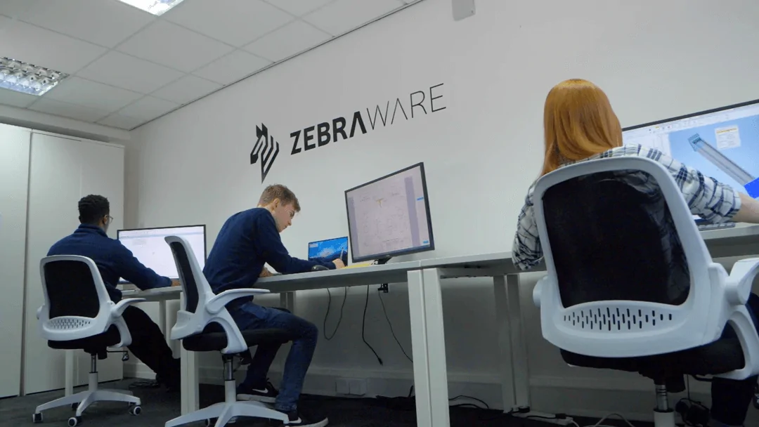 Zebraware Staff at computers in an office